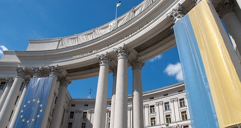 The Ukrainian and EU banners hanging from the Ukrainian Ministry of Foreign Affairs government building in Kiev, Ukraine.