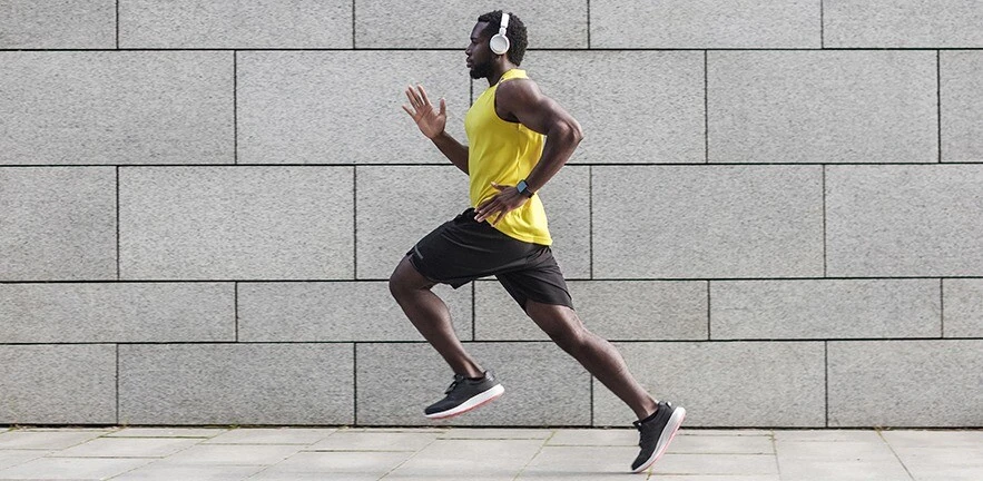 Profile portrait of a muscular male runner.