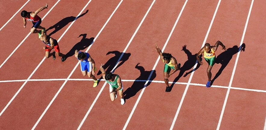 Runners competing on track.