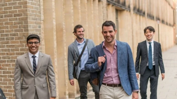 Cambridge students walking down the street.