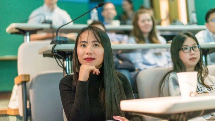 Female student in a lecture.