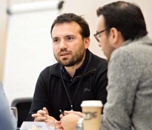 Man engaged in conversation.