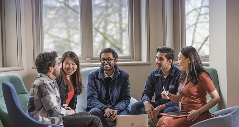 MFin students smiling.