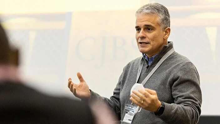 Image of Professor Stelios Kavadias teaching in a classroom.