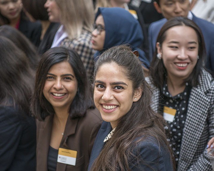 MBA women smiling.