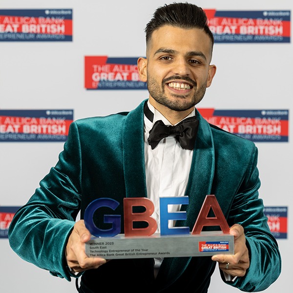 Varun Bhanot of MAGIC AI accepting a GBEA award.