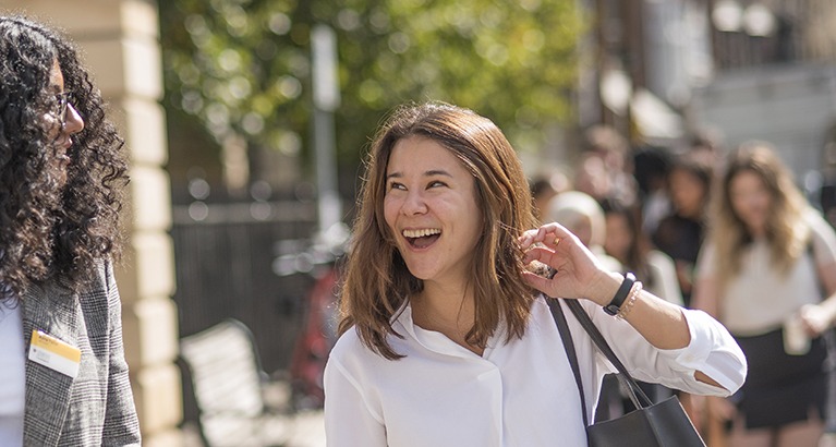 MBA people smiling during orientation day.