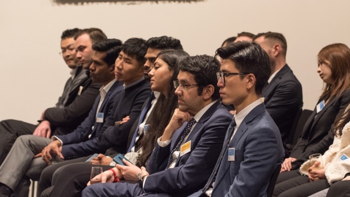 Students listening to a lecture.