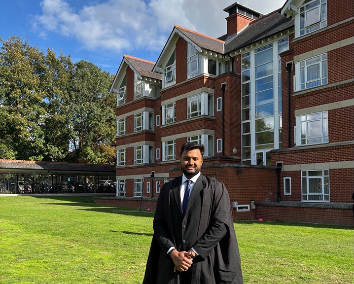 Sayam dressed in his formal gown for a college event.