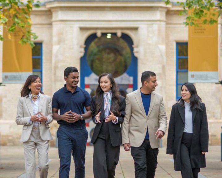 Students talking outside the Business School.